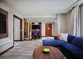 Superior Suite, 1 King Bed, Corner | Living area | 65-inch Smart TV with digital channels, streaming services