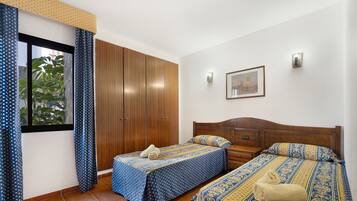 1 dormitorio, tabla de planchar con plancha, wifi gratis y ropa de cama