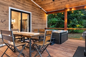 Relaxation and fun in one spot | Mini Shuffleboard and Hot Tub - Hot Tub | Outdoor Games | Pet-Friendly Cabin (Broken Bow)