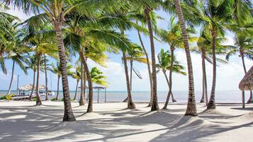 Private beach, white sand, sun-loungers, beach towels