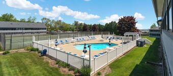 Refreshing pool view condo at Nautical Mile resort Pool Tennis Courts