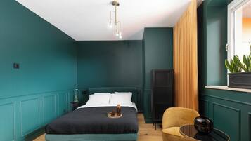 Chambre Double Deluxe | 1 chambre, coffres-forts dans les chambres, rideaux occultants