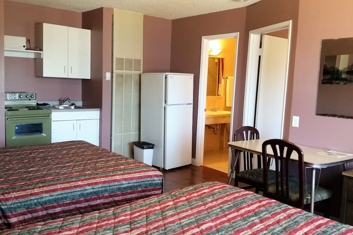 Family Double Room, Multiple Beds, City View | Laptop workspace, free WiFi, bed sheets