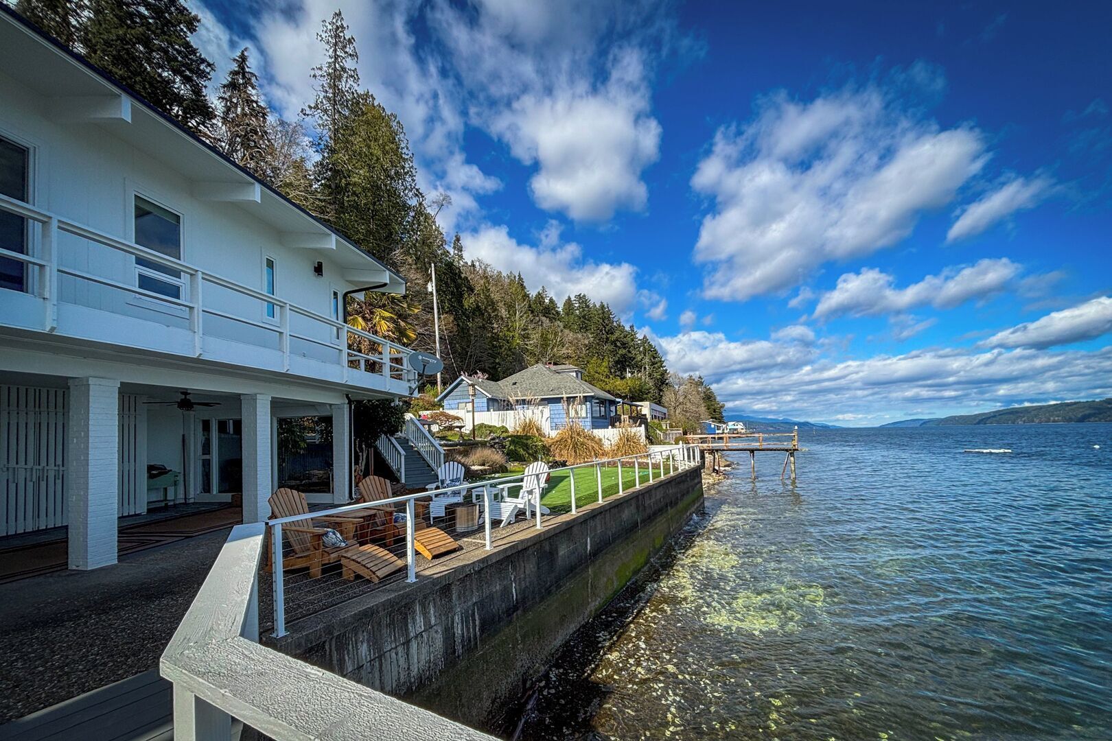 Wrap-around upper deck and lower level with 180 deg views of the Hood Canal