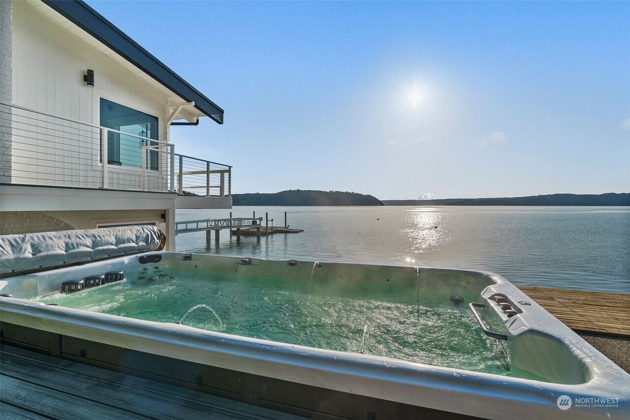 Large Swim spa hot tub enough room for 10. Relax while you enjoy the view.