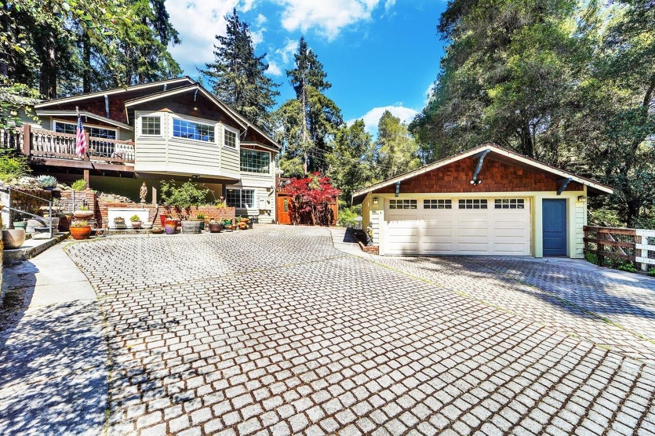 Estate nestled within Redwoods with a majestic fireplace in Santa Cruz County!
