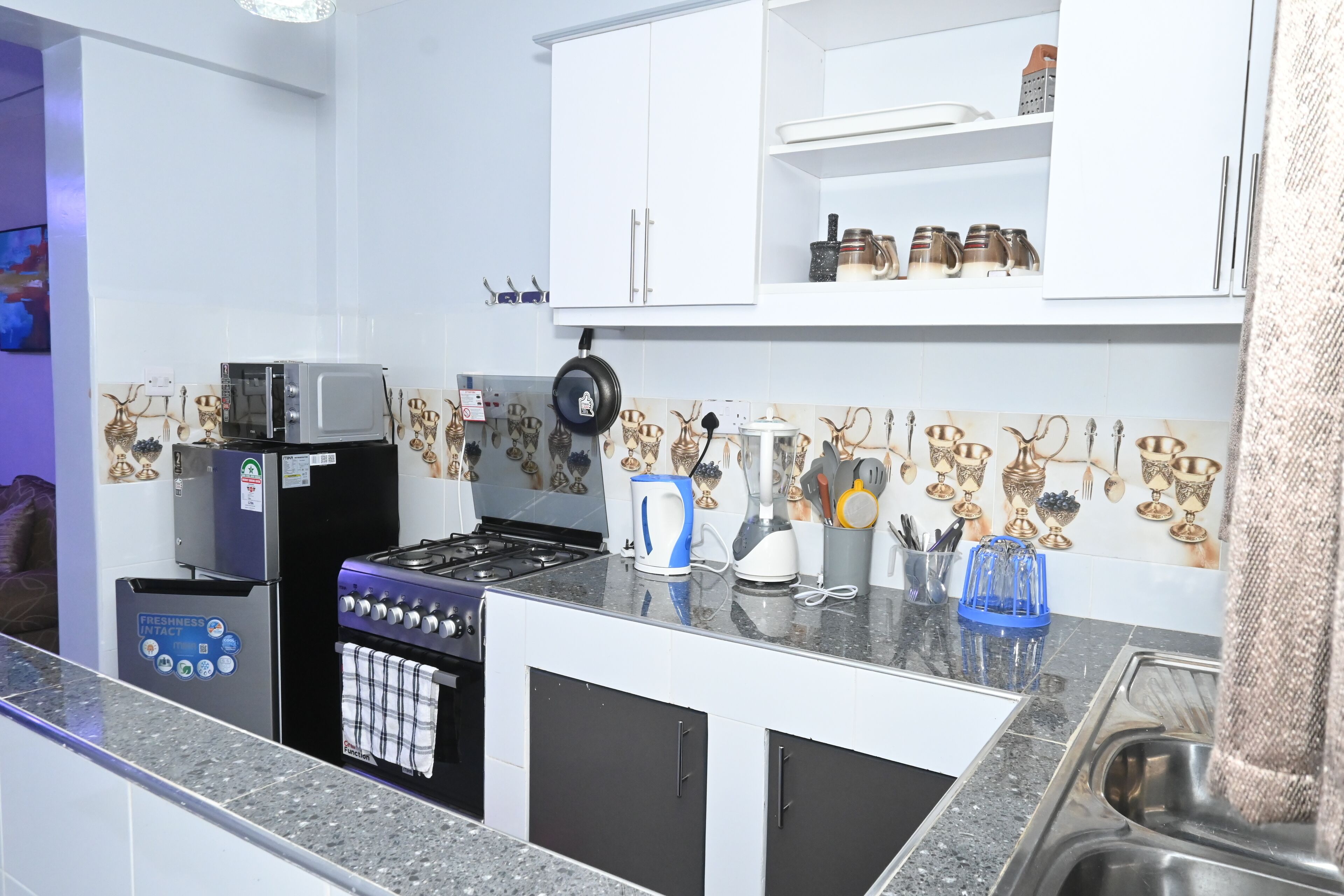 Superior Suite, 2 Bedrooms | Private kitchen | Fridge, microwave, oven, cookware/dishes/utensils
