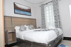 Suite Deluxe, 3 chambres | Literie de qualité supérieure, décoration personnalisée