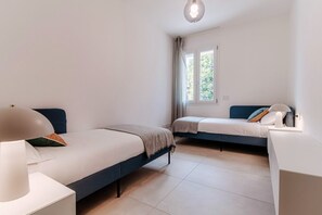 2 dormitorios, tabla de planchar con plancha, wifi gratis y ropa de cama