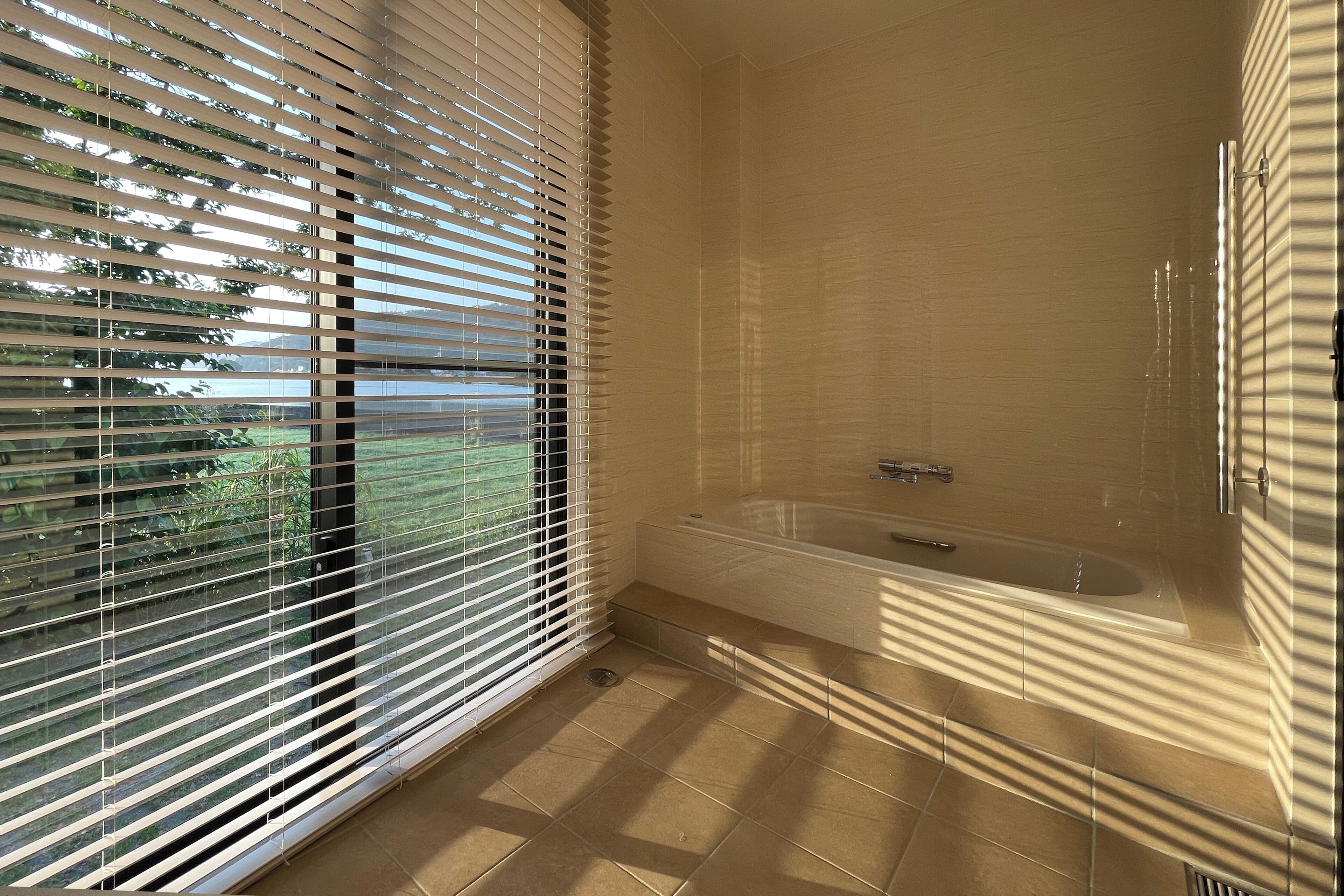 Deluxe Villa, River View | Bathroom | Slippers