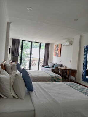 Twin Room, Balcony | Desk, laptop workspace, iron/ironing board, free WiFi - Triple 888  Suites (Labuan Bajo)