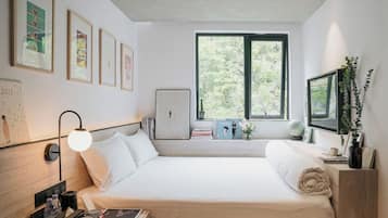 Individually decorated, desk, blackout curtains, iron/ironing board