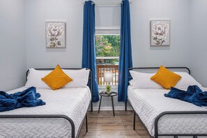 4 bedrooms, laptop workspace, iron/ironing board, bed sheets