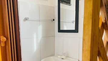 Shower, towels, soap, toilet paper