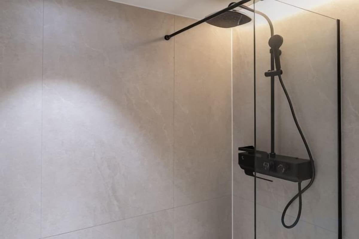 Bathroom | Shower, hair dryer, slippers, bidet
