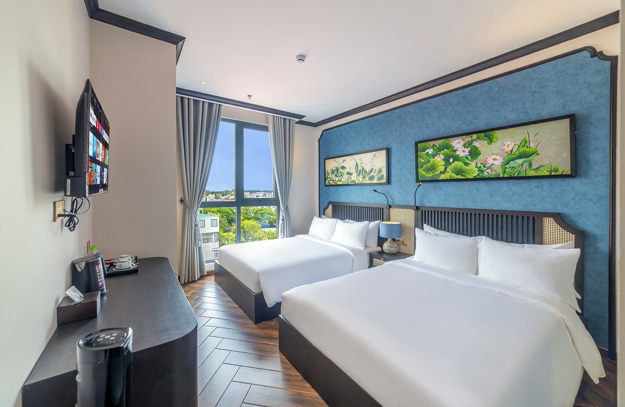 Deluxe Twin kamer | Donsdekens, bedden met traagschuimmatrassen, een minibar