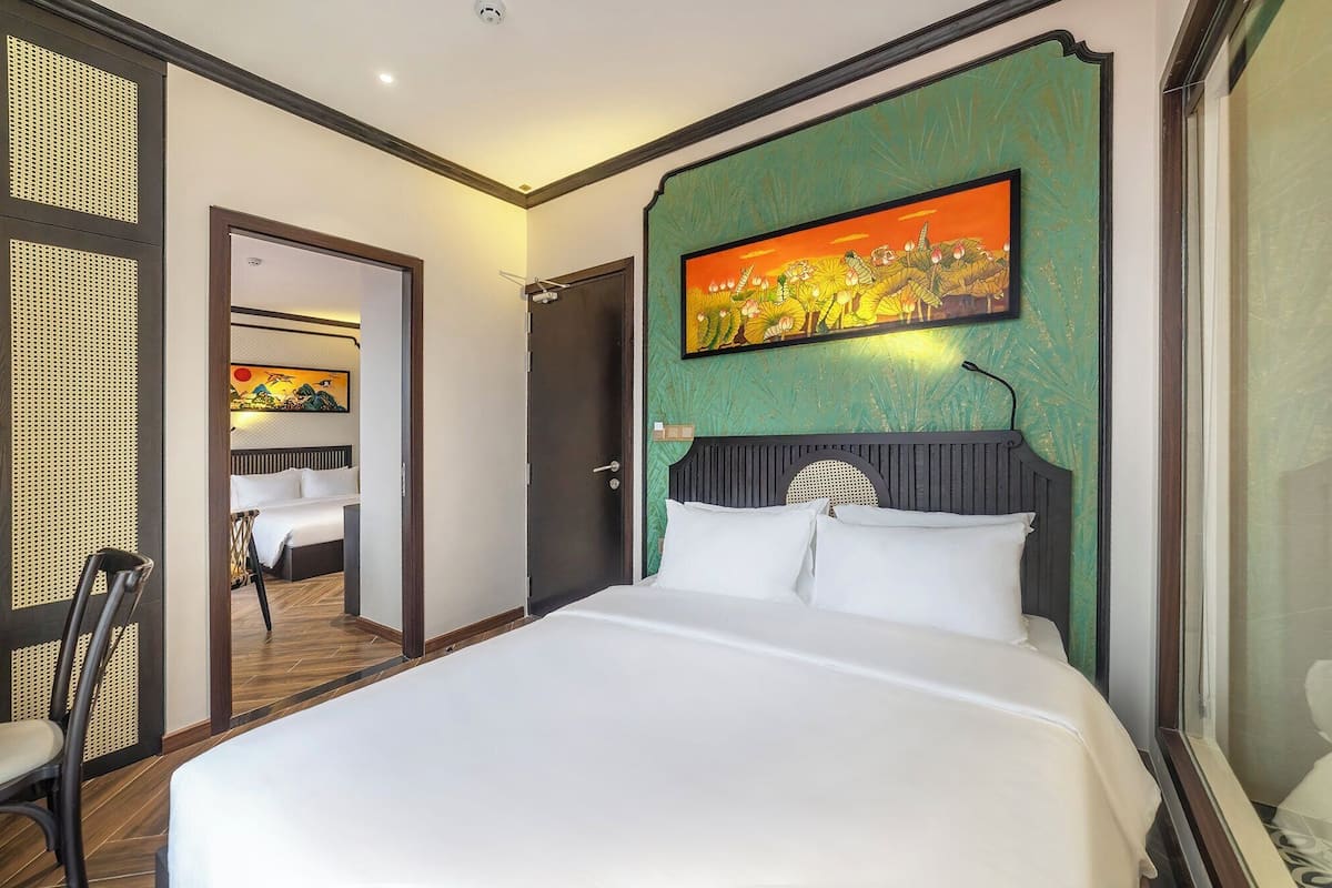 Family Room | 2 bedrooms, down comforters, memory foam beds, minibar