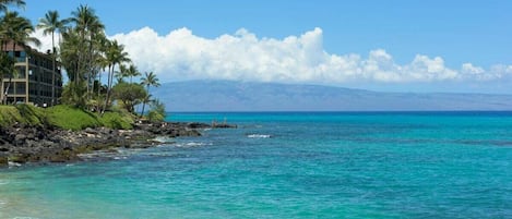 On the beach, sun-loungers, beach towels