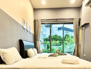Apartamento, 3 habitaciones | Espacio para trabajar con un portátil, wifi gratis, ropa de cama