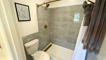 Hair dryer, towels, soap, shampoo