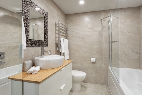Hair dryer, towels, soap, shampoo