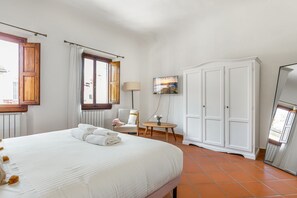 1 slaapkamer, een strijkplank/strijkijzer, wifi, beddengoed