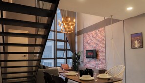 Departamento Deluxe | Área de sala de estar | Televisión de pantalla plana, Netflix y servicios de streaming 