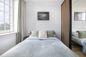 Leilighet, 1 soverom, kjøkken | 1 soverom, individuelt innredet og skrivebord for bærbar PC