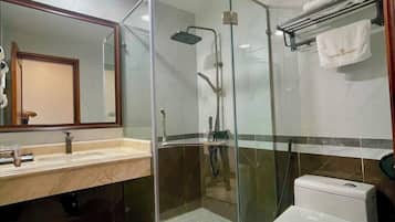 Deluxe Room, City View | Bathroom | Separate bathtub and shower, rainfall showerhead, hair dryer, bathrobes