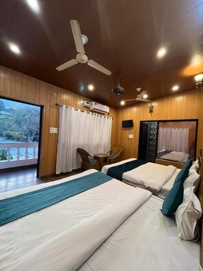 Family Suite, Garden View | Desk, laptop workspace, free WiFi - Hotel Heavens Door (Narendranagar)