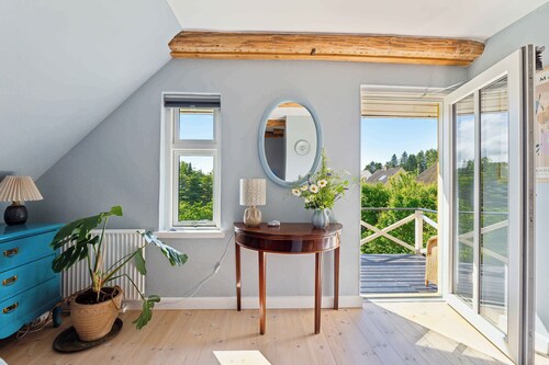 Beautiful yellow country villa by the water