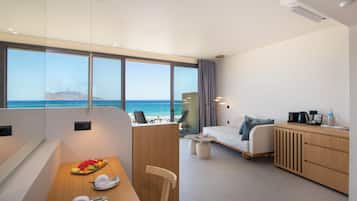 Sky Junior Suite Sea View | Living area | 55-inch Smart TV with satellite channels, streaming services
