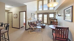 TV, fireplace - Top Floor Condo with Stunning Mountain Views (Fernie)