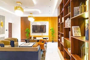 Luxury Apartment | Living area | Flat-screen TV - Sujimoto AveMontaigne BananaIsland Ikoyi (Lagos)