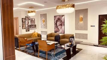 Departamento de lujo | Área de sala de estar | Televisión de pantalla plana