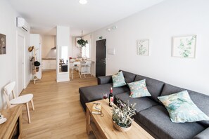 Apartment, 1 Bedroom | Living area | Flat-screen TV