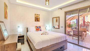 Premium bedding, down duvets, memory-foam beds, desk