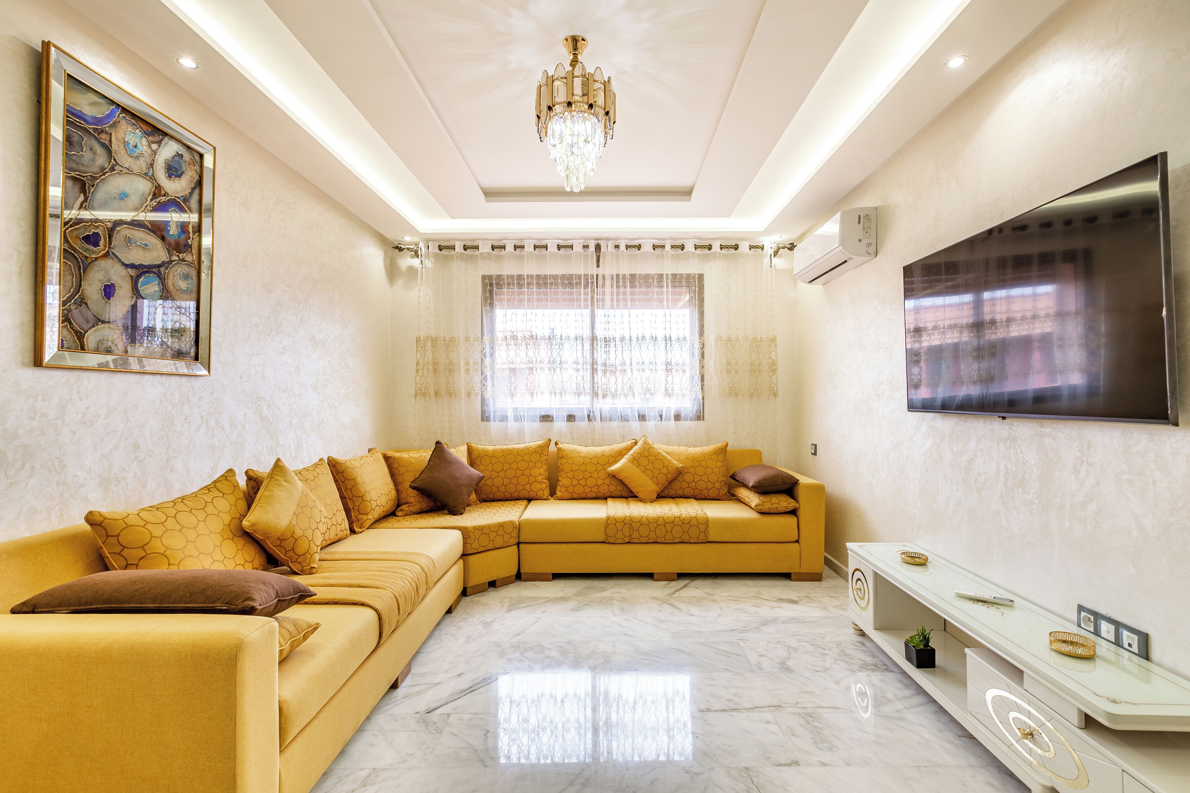 Luxury Apartment | Living area | 40-inch flat-screen TV with digital channels