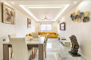 Luxury Apartment | Living area | 40-inch flat-screen TV with digital channels - Vittoria Guest House Marrakech (Marrakech)