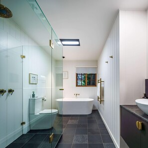 Shower, hair dryer, towels, shampoo