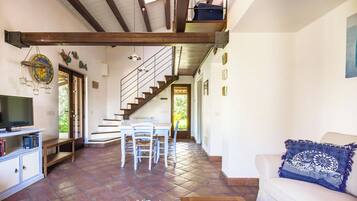 House, Partial Sea View | Living area | 35-inch TV with digital channels