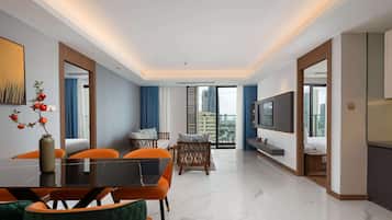 Three Bedroom Suite City View | Living area | 49-inch Smart TV with digital channels, fireplace