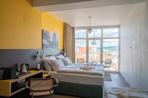 Chambre Panoramique, plusieurs lits, vue ville, niveau Exécutif