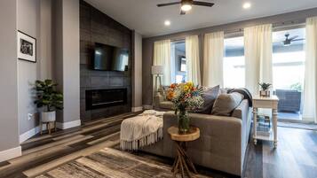 Smart TV, fireplace, books