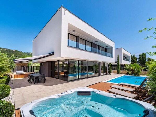 Seasonal outdoor pool, pool umbrellas, pool loungers