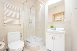 Apartment, 3 Bedrooms, 2 Bathrooms | Bathroom | Separate tub and shower, towels, soap, shampoo - Cozy Apartment for 5 by Renters (Warsaw)