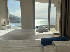 4 室のベッドルーム、WiFi (無料)、ベッドシーツ