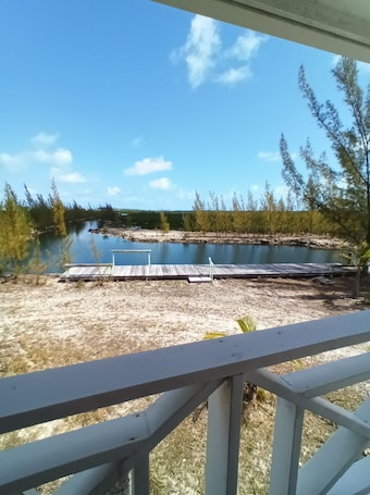 Property grounds. Secluded, private waterfront 4BR house in Bimini. Includes golf cart, kayak, and stunning views