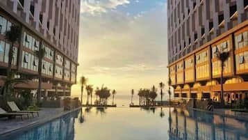5 outdoor pools, open 6:00 AM to 8:00 PM, pool umbrellas, sun loungers