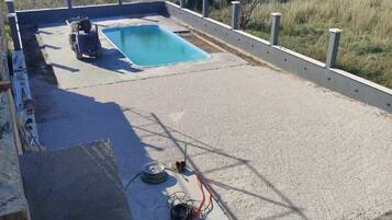 Seasonal outdoor pool, pool umbrellas, sun loungers